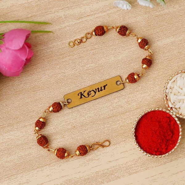 Customized Name Engraved Rudraksha metal plate Rakhi main display image