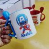 Customizable Photo Text Ceramic Mug With Spoon luvecloset display image of blue color mug looks on hand